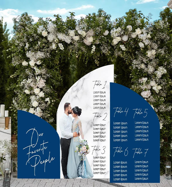 Flower arch with custom seating chart.