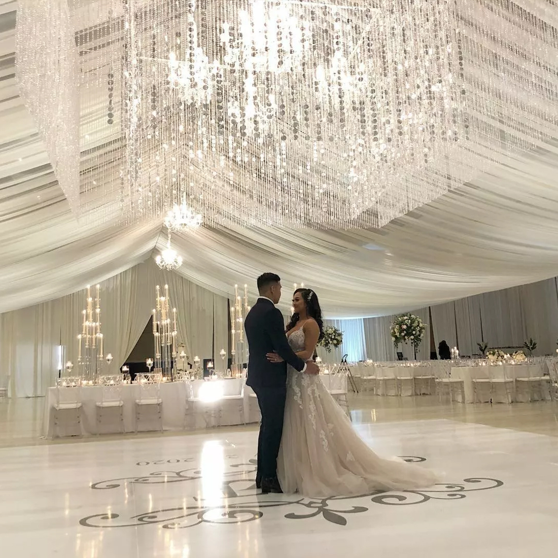 event branding service: couple dancing on custom floor